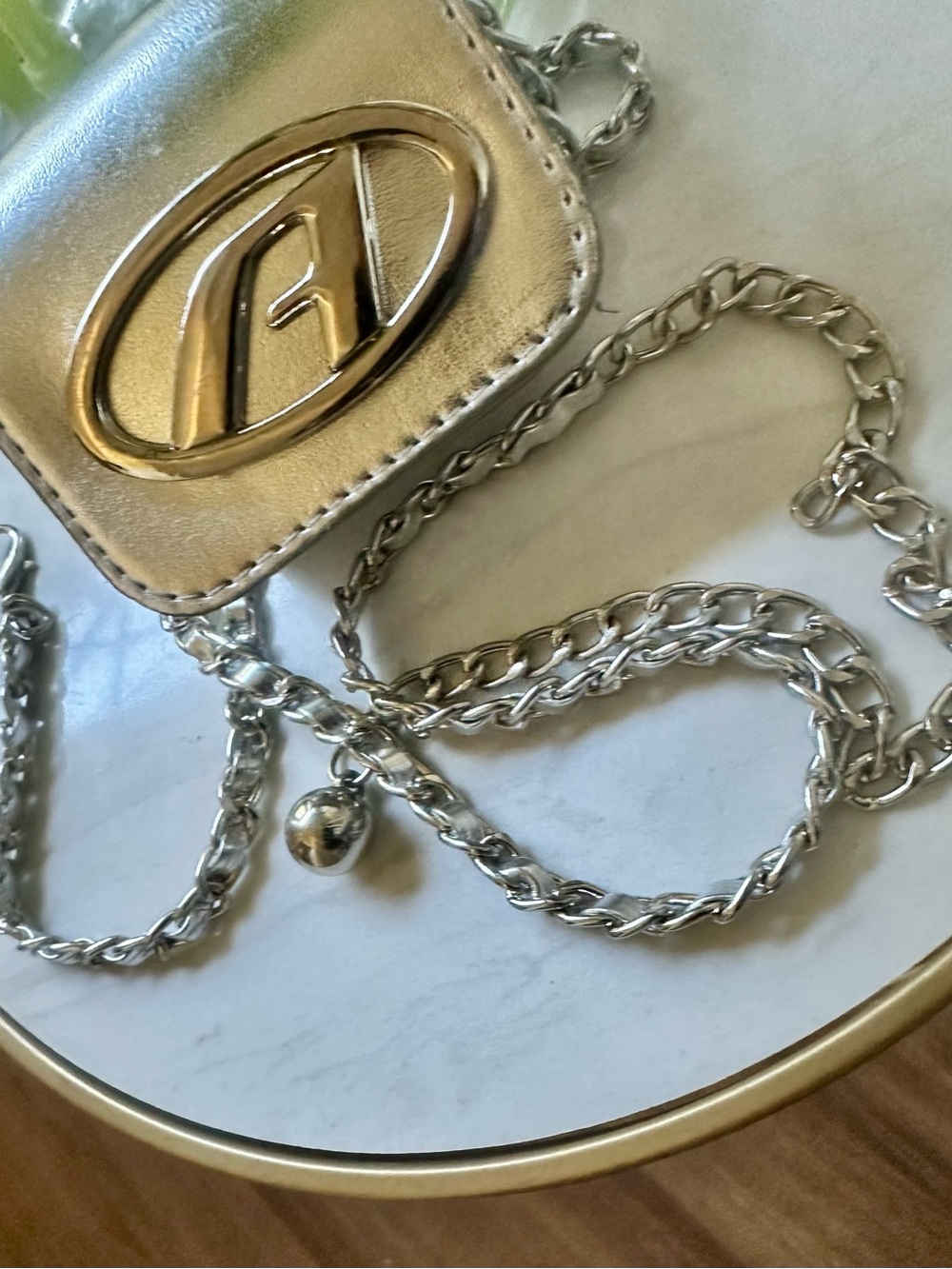 Metallic Silver Chain Crossbody Bag with Gold Accent Logo( lipstick bag)